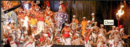 Kandyan dancer with torch